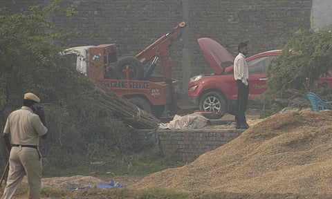 A red Ford EcoSport car suspected to be linked to the Delhi Red Fort blast case has been traced and seized in Faridabad district's Khandawali, Thursday, Nov. 13, 2025 (PTI) 
