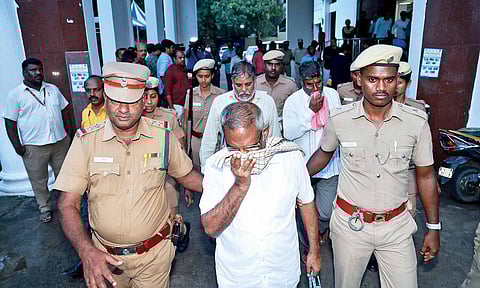 The three convicts — Jagadish, Rakesh and Ashok—leave the court after the hearing