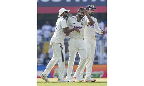 India's Jasprit Bumrah celebrates with teammates Mohammed Siraj and KL Rahul after taking the wicket of South Africa's Aiden Markram during the first day of the second Test cricket match between India and South Africa. (Photo: PTI)