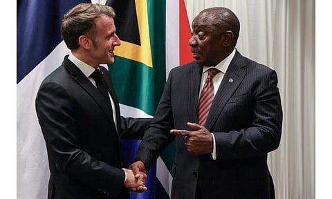 France’s President Emmanuel Macron, left, shakes hands with South Africa’s President Cyril Ramaphosa during their bilateral meeting at the Sandton Convention Centre in Sandton, South Africa ahead of the G20 leaders’ Summit. (Photo: AP)