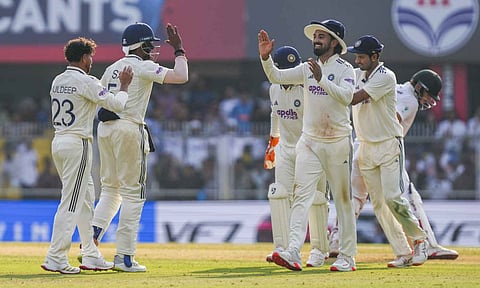 India's Kuldeep Yadav celebrates with teammates after taking the wicket of South Africa's Tristan Stubbs during the first day of the second Test cricket match between India and South Africa, at ACA Stadium, Barsapara in Guwahati, Saturday, Nov. 22, 2025 (PTI) 