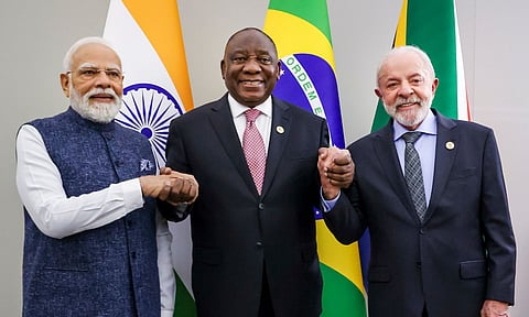 In this image received on Nov. 23, 2025, Prime Minister Narendra Modi with South African President Cyril Ramaphosa, center, and Brazilian President Luiz Inacio Lula da Silva, right, during IBSA Leaders' meeting, on the sidelines of the G20 Summit, in Johannesburg, South Africa. (PMO via PTI )