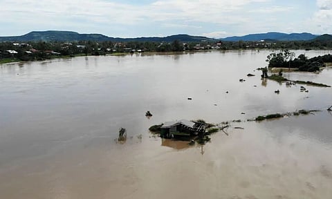 This aerial photo shows a building submerged in flooding in Dak Lak, Vietnam on Friday, Nov. 7, 2025 after Typhoon Kalmaegi lashed Vietnam with fierce winds and torrential rains. (AP)
