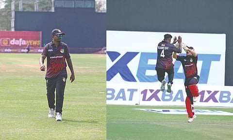 Ramesh Kalimuthu jumping in joy after taking a wicket in a T20 match