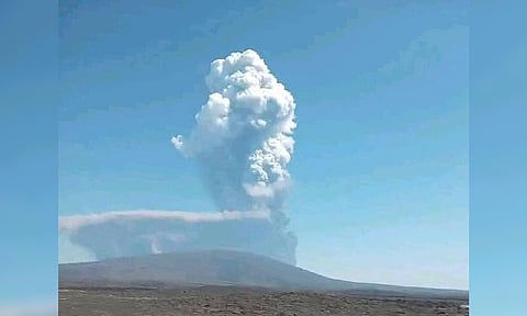 Ash billows from the first time eruption of the Hayli Gubbi Volcano in Ethiopia's Afar region