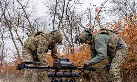Ukrainian soldiers with the Kraken 1654 unit prepare a Vampire drone in Kharkiv Oblast, Ukraine. (Photo: AP)