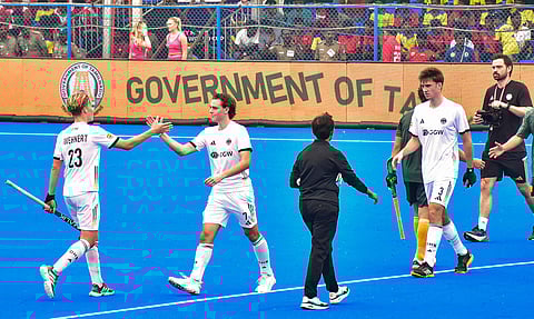  Germany and South African players exchange greetings after the former won the inaugural match of the Hockey Men's Junior World Cup 2025, in Madurai, Tamil Nadu, Friday, Nov. 28, 2025 (PTI) 