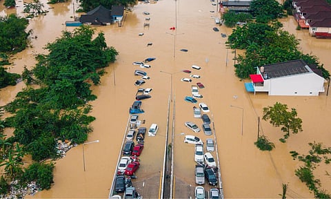 Cars and houses are submerged in floodwaters in the Songkhla province of southern Thailand, Nov. 26, 2025 (AP)