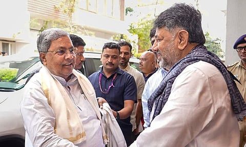 Karnataka Chief Minister Siddaramaiah with Deputy CM DK Shivakumar during a breakfast meeting at his residence, in Bengaluru, Karnataka. (PTI) 