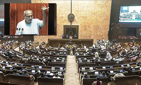 Rajya Sabha Chairman CP Radhakrishnan conducts proceedings in the House amid protest by opposition members in the well during the Winter Session of Parliament in New Delhi, Tuesday, Dec. 2, 2025. (PTI) 
