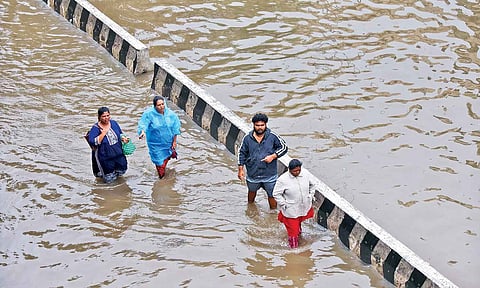 Residents experiencing knee-deep stagnation as sewage mixed with rainwater. 
