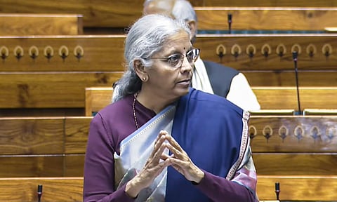 Union Finance Minister Nirmala Sitharaman speaks in the Lok Sabha during the Winter session of Parliament, in New Delhi, Friday, Dec. 5, 2025. (PTI) 