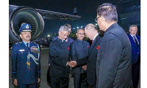 Union External Affairs Minister S Jaishankar greets Russian President Vladimir Putin as the latter prepares to depart from New Delhi (PTI) 