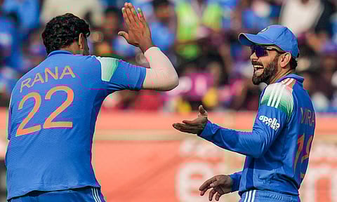 India's Virat Kohli and Harshit Rana interact during the third ODI cricket match of a series between India and South Africa, at ACA-VDCA Cricket Stadium, in Visakhapatnam, Andhra Pradesh, Saturday, Dec. 6, 2025 (PTI) 