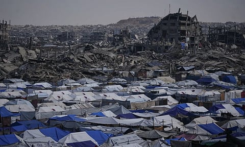 Tents sheltering displaced Palestinians stand amid the destruction left by the Israeli air and ground offensive in Gaza City (Photo: AP)