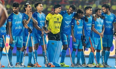 Indian players line-up at the centre line during penalty shoot-out 
