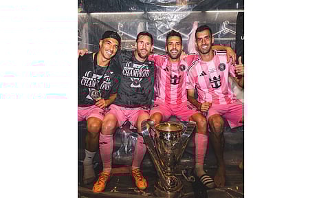 Luis Suarez, Lionel Messi, Jordi Alba and Sergio Busquets with the trophy 