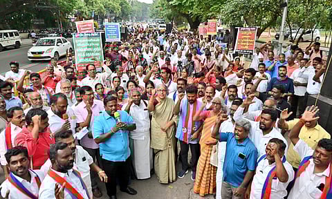 Left, TVK workers at a protest in Chennai on Monday