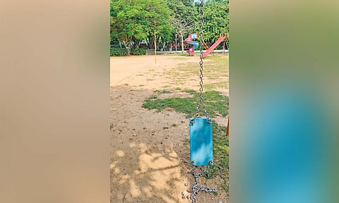 Broken swing at the park