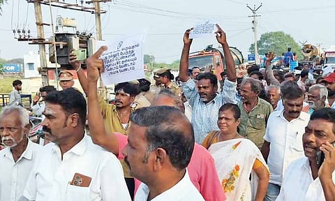 Residents of Nallur staging a road roko on Tuesday