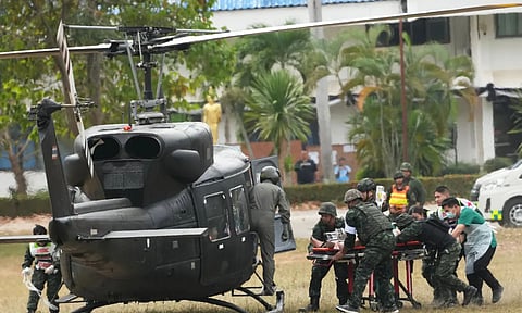 A wounded Thai soldier is carried to be transferred to a hospital in Surin province, Thailand, on Wednesday, Dec. 10, 2025, following clashes between Thai and Cambodian soldiers. (AP)