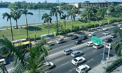 A high-angle view of a busy road with famous Inya Lake in the background in Yangon, Myanmar, Wednesday, Dec. 10, 2025. (AP) 