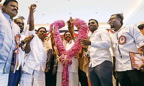 AIADMK general secretary Edappadi Palaniswami being garlanded at the general council meeting