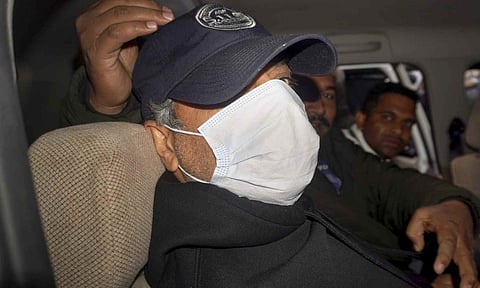 Goa Police bring Ajay Gupta, one of the four owners of the 'Birch by Romeo Lane' nightclub, to the Sunlight Colony Crime Branch office in connection with the North Goa fire tragedy that kills 25 people, in New Delhi (PTI) 