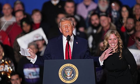 President Donald Trump greets locals as he speaks at the Mount Airy Casino Resort in Mount Pocono, Pa., Tuesday, Dec. 9, 2025. (AP) 
