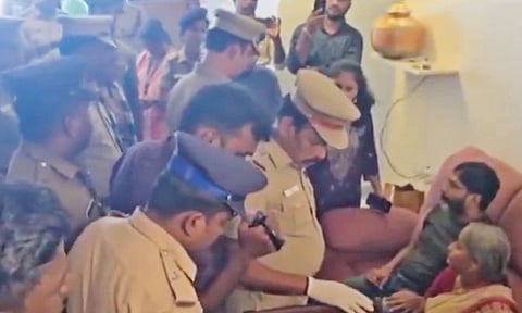 Policemen at Savukku Shankar’s residence in Chennai on Saturday