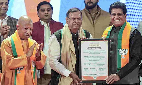 Union Minister Piyush Goyal, Uttar Pradesh Chief Minister Yogi Adityanath, state Deputy Chief Minister Brajesh Pathak with newly elected BJP state president Pankaj Chaudhary during the 'Sangathan Parv' event, in Lucknow, Sunday, Dec. 14, 2025 (PTI) 