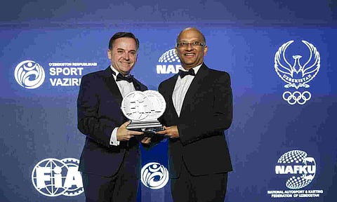 Manuel Avino, Vice President, FIA Europe, presenting the title to Arun Mammen, VC, MD, MRF Ltd 