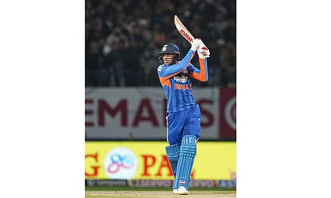  India's Shubman Gill plays a shot during the third T20 International cricket match of a series between India and South Africa, at HPCA Stadium, in Dharamshala, Himachal Pradesh, Sunday, Dec. 14, 2025 (PTI) 