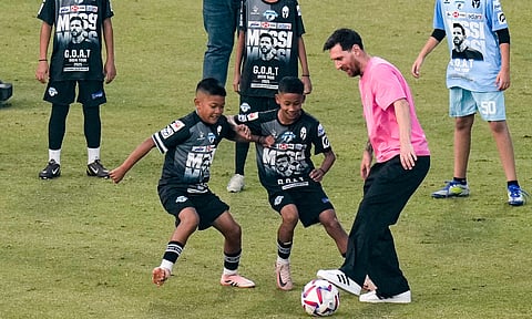 Argentine footballer Lionel Messi, centre, during the final leg of his 'GOAT India Tour 2025', at Arun Jaitley Stadium in New Delhi (PTI)