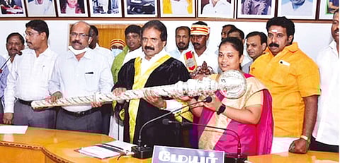 Mayor Mu Anbalagan receiving the silver sceptre gifted by Salem MLA from Collector S Sivarasu