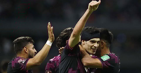 Mexico's Raul Jimenez celebrates scoring with teammates after their second goal