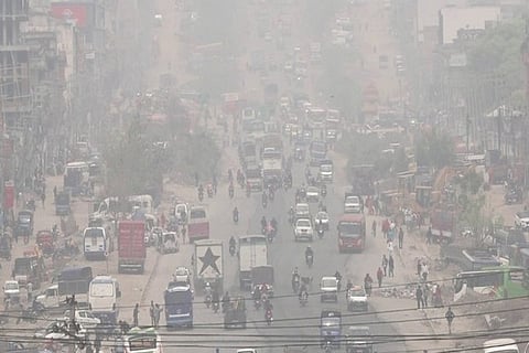 A road section of Kathmandu is covered by haze reducing visibility for the vehicles