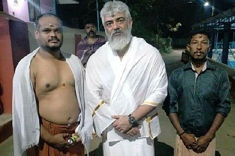 Ajith with the devotees in the Temple.