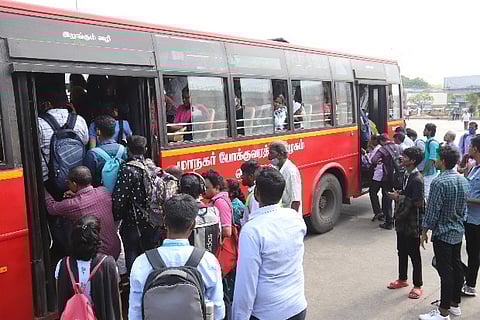 People boarding the bus.