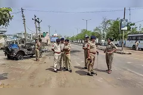 Security officials in Himmatnagar, Gujarat.
