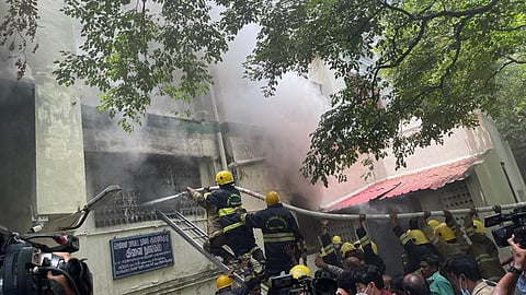 Firefighters are engaged in dousing the fire