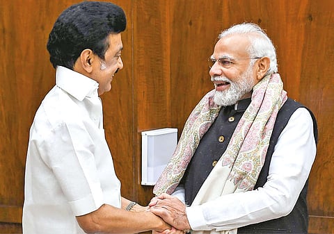 Modi shakes hands with Stalin during the meeting in Delhi