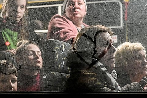 People inside the evacuee bus.