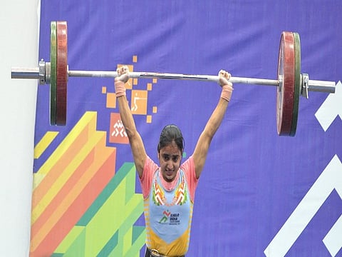 Weightlifter Komal Kohar of Maharshi Dayanand University Rohtak in action during KIUG 2021