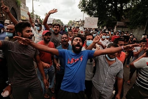 All 26 ministers aside from President Gotabaya Rajapaksa and his elder brother Prime Minister Mahinda Rajapaksa stepped down