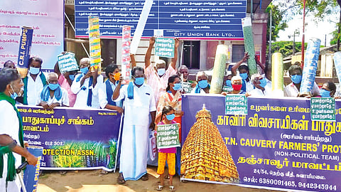 Farmers staging a protest for free power supply in Thanjavur on Saturday.