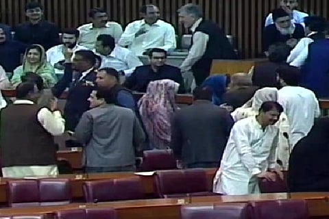 PTI members walk out of the session to elect the new prime minister.
