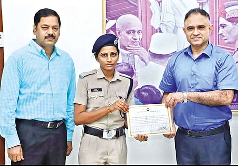 RPF constable A Mathuri being felicitated by Southern Railway General Manager B G Mallya