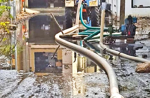 Sludge on one of the roads after sewage water is pumped out.