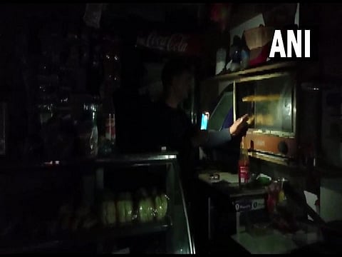 Visual of a confectionary shop in Jharkhand, being run during power outage